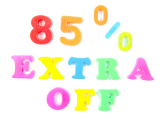85% extra off written in fridge magnets