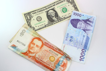 Peso dollar won bill