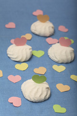 Marshmallow decorated with coloured paper hearts