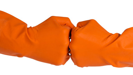 two fists in orange gloves