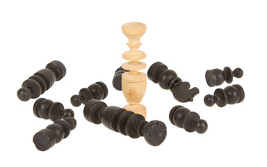 Old handcarved chess pieces isolated