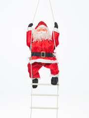toy santa climbing a ladder