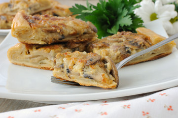 A piece of the pie with mushrooms