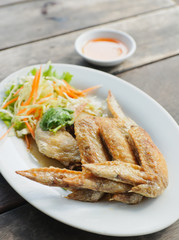 Fried chicken wings on a plate