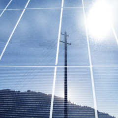 solar panel and electric cable in sky