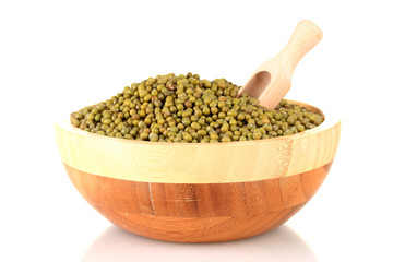 Green mung beans  with scoop in bowl isolated on white