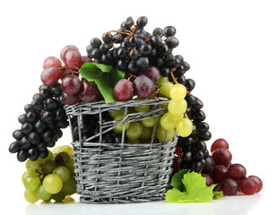 assortment of ripe sweet grapes in basket, isolated on white.