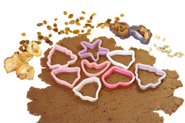 cookie cutters on the rolled out dough