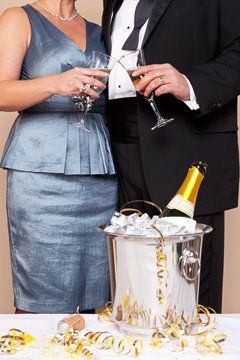 Couple touching glasses for a Champagne toast