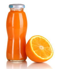Delicious orange juice in a bottle and orange next to it
