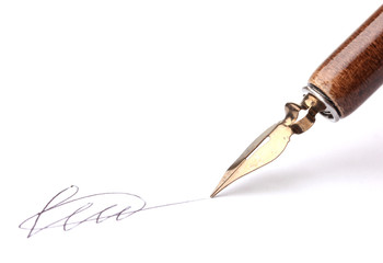 Closeup of signature (fake, not real) and ink pen, isolated