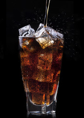 Fresh cola drink background with ice