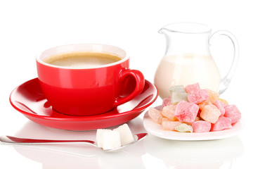 Red cup of coffee with milk and rahat delight isolated on white