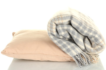 Woolen checkered plaid and pillow, isolated on white