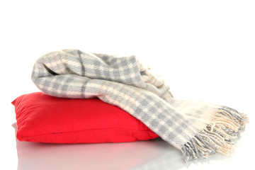 Woolen checkered plaid and pillow, isolated on white