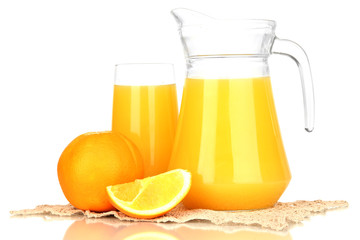 Full glass and jug of orange juice and oranges isolated on