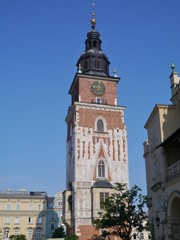 Fototapeta na wymiar The tower of the city hall on the Market in Krakow in Poland