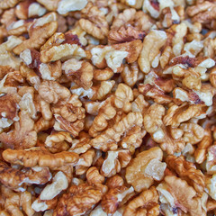 peeled walnuts closeup, food background
