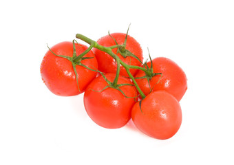 Red ripe tomatoes isolated on white background