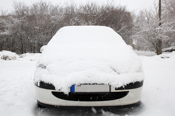 Car coverd with snow