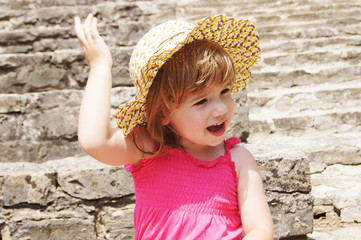 little girl in summer hat
