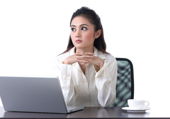 business woman sitting in the office and worry about something