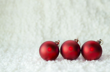 Christmas red balls on the white background
