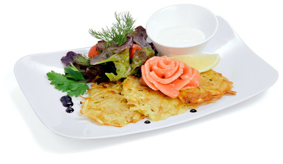 Red fish on the plate with lemon