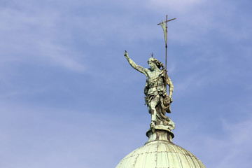 Statue on The copper dome of the church of San Simeon Piccolo