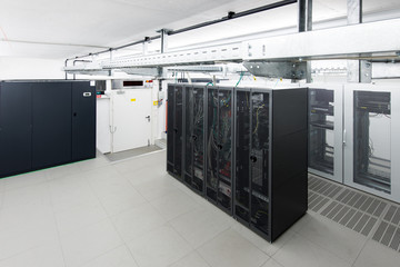 small air conditioned server room with climate control unit - obrazy, fototapety, plakaty