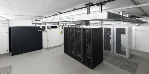  small air conditioned computer room with racks an cable trays
