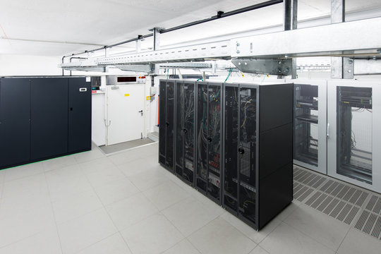 small air conditioned server room with climate control unit