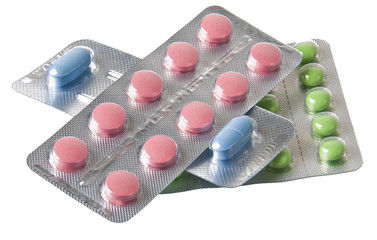 pills packed in blisters isolated on white background 