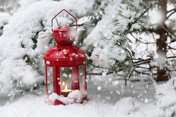 Christmas red lamp in the forest