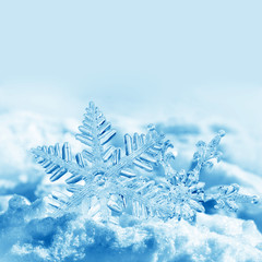 Christmas snowflakes on snow