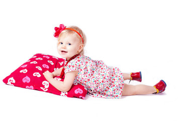 Lovely baby play with a large pillow, Stodio