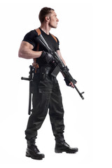 Police officer is holding Kalashnikov