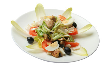 salad with mushrooms, eggs, tomatoes and olives