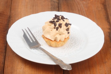 cake with cream and chocolate topping