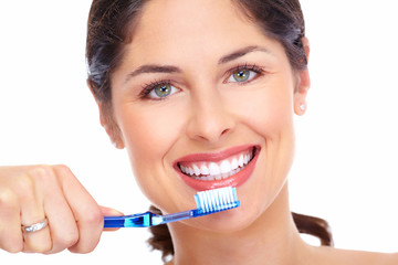 Obrazy na Plexi  Piękna kobieta uśmiech szczoteczką do zębów.