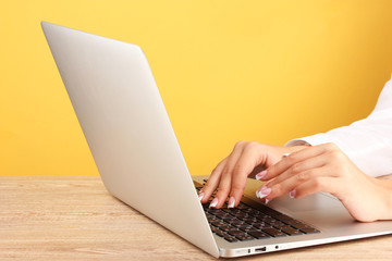 business woman's hands typing