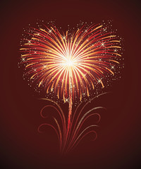 Firework in a shape of heart on the red background.