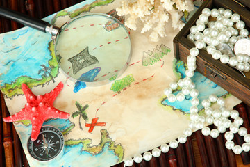 map of treasures on dark wooden background