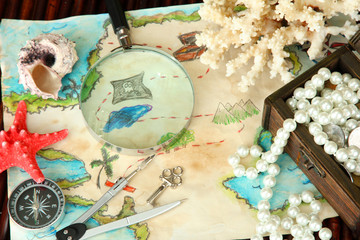 map of treasures on dark wooden background