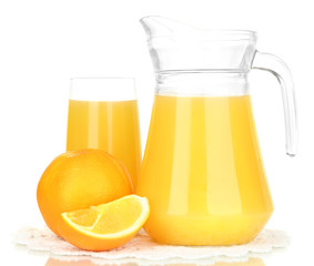 Full glass and jug of orange juice and oranges isolated on