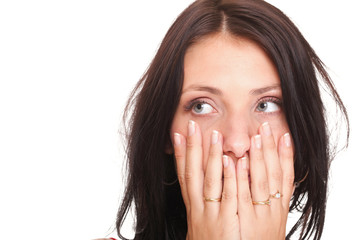 Young woman covering her mouth both hands isolated