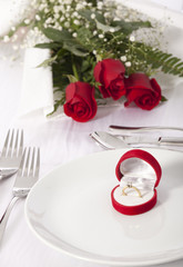 Ring in gift box on celebratory table of Valentine's Day 