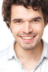 Obraz na płótnie Canvas Smiling Young Man Portrait