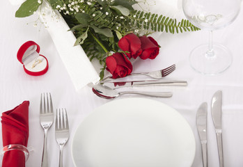 Ring in gift box on celebratory table of Valentine's Day 