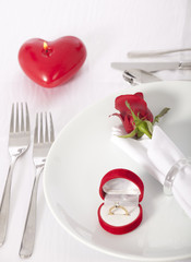 Ring in gift box on celebratory table of Valentine's Day 